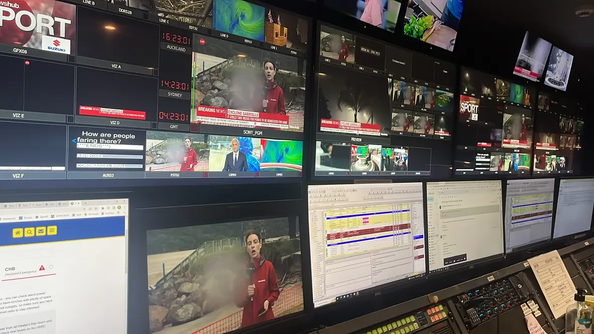 Inside a live newsroom control room showing the fast-paced environment journalists work in - where great stories stand out.